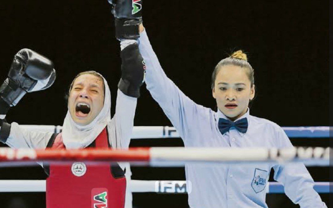 عکس روژان بهنامی قهرمان موی تای 